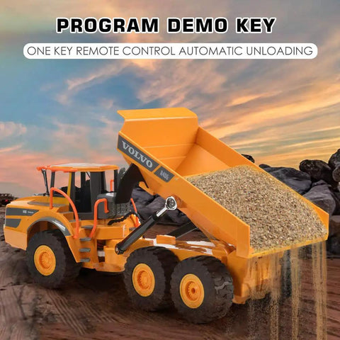 Volvo Authorized RC Dump Truck Toy For Kids unloading sand on rocky terrain with remote control feature visible