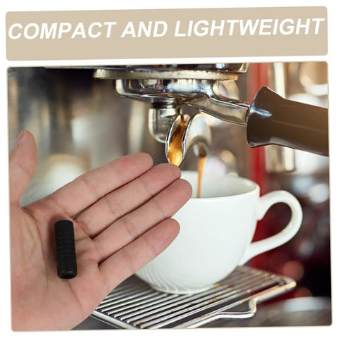 2 Pack Heat Resistant Steam Wand Covers For Espresso Machines Rubber Insulation Sleeve To Prevent Burns Fits Various Steam Pipes Barista Safety Gear Essentials shown in hand next to espresso machine