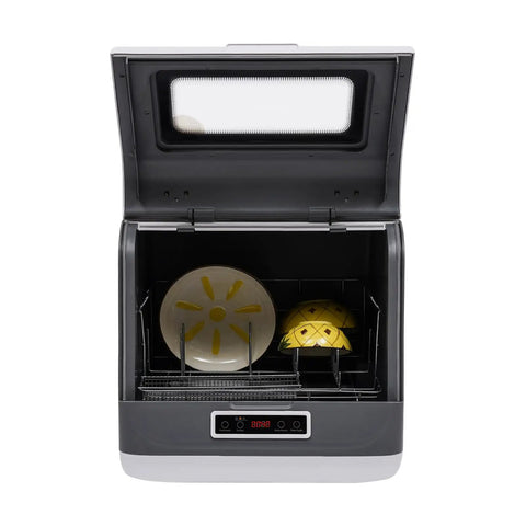 Compact Portable Countertop Dishwasher Featuring Three Wash Cycles And A Straight Up No Install Faucet Setup showing dishes inside.