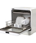 Portable Countertop Mini Dishwasher Featuring Four Quick Wash Cycles And Slick High Heat Sanitizing Plus Seamless Air Dry For No Muss No Fuss Apartment Dorm Or Road Trip Setup with dishes loaded.