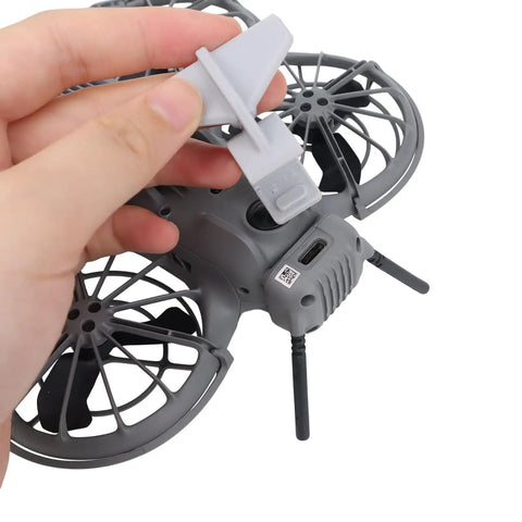 Aerodynamic Tail Fin Shield For Neo 2 Drone Lightweight 3.8g Transmission Module Protector Shockproof Cover shown being attached