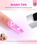 Airbrush Gel Nail Polish Set With 12 Vitality Colors Hema Free Dilution Free Non Acetone Formula Fine Mist For Easy Spray French And Ombre Nail Art Odorless Safe Nail Kit For Salon Or At Home showing pink nail art with hearts and airbrush tool.