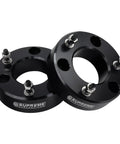 Keep Your Pickup Tight And Lifted With This 3 Inch Front Leveling Kit Built For Chevy Silverado 1500 And GMC Sierra 1500 Trucks Using Rugged T6 Billet Aluminum Strut Blocks That Smooth Out The Dash And Make Weekend Trails Feel Like A Dream Cruise - black T6 billet aluminum strut blocks with bolts.