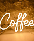 Coffee Neon Light Sign USB Powered Wall Or Table Decor For Home Kitchen Cafe Bar Warm White 11.8 Inch By 6.69 Inch Night Light Mood Builder With Pre Drilled Holes And 6.6 Ft USB Cord on floral background.