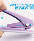 Close-up of purple heavy-duty single hole punch for up to fifteen sheets, showing easy punching mechanism and skid-resistant base.