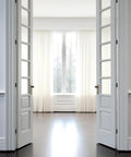 Open white double doors with heavy duty built to last 3.5 inch matte black door hinges 18 pack with lubricant enhanced for smooth silent operation five eighths inch radius corners compatible with interior and exterior doors includes screws.