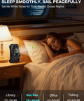 Sleeping woman with Cruise Ship Approved Magnetic Fan on bedside, gentle breeze, cabin setting.