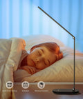 Smart LED Desk Lamp With Eye Caring Light, Stepless Dimming And Timer beside a sleeping child, in a cozy bedroom setting.