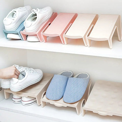 Hella Solid Double Layer Shoe Slot Organizer Rack With Non Slip Grip Base For Sneakers And Everyday Kicks To Keep Your Closets Stacked And Floors Crisp Today, featuring two layers of storage with white sneakers and slippers.