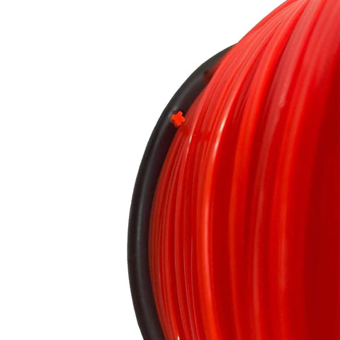 Close-up of Beefy Cross.095 Trimmer Line Replacement Spool 1280 Ft 5 Lb Red Nylon 66 Copolymer Weedeater String on spool
