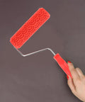 Rubber Texture Paint Roller For Easy Peasy Wall Embossing And Quick Home Reno Makeovers That Deck Out Your Space With Knockout Decorative Finishes And Zero Stress held in hand with distinct texture pattern.