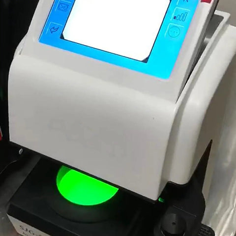 Automatic Edge Grinding Machine For Eyewear With Scanner And 7 Inch Touch Screen with green optical scan light visible