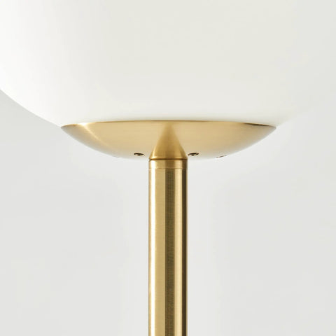 Close-up of Luna LED Floor Lamp Dope Modern Tall Light For Living Rooms And Home Offices With Frosted Glass Globe in brass finish.