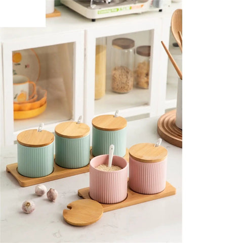 Top Shelf Ceramic Coffee Storage Jar With Secure Wooden Lid And Airtight Design Keeps Daily Grind Sugar Salt Tea Fresh As Ever While Looking Slick On Any Modern Counter Space, displayed in pastel colors on a wooden tray.