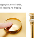 Top Shelf Stainless Steel Gold Vessel Sink, Semi Circular Above Counter Basin With Push Type Drain showing copper push-bounce drain.