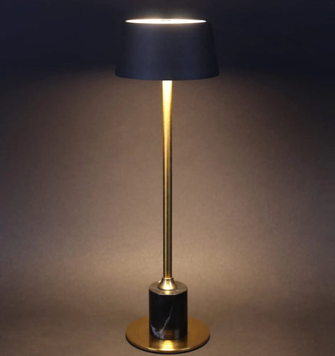 Cordless Rechargeable Table Lamp With 2500mAh Battery on marble chassis, warm glow, shown in dark room setting