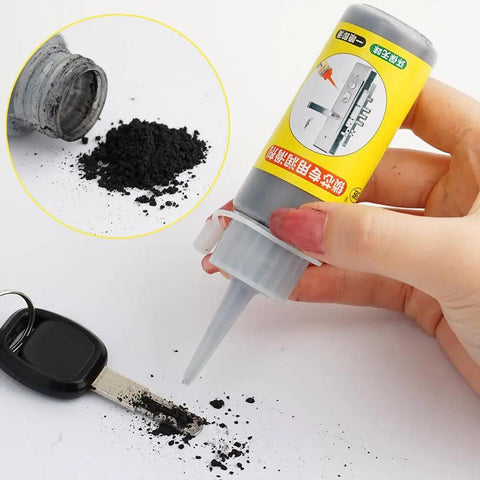 Hand holding Two Pack Lock Cylinder Graphite Lubricant Powder With Needle Tube Dust Free Lubricant for Keys, Doors and Hinges