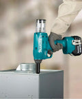 Heavy Duty Cordless Rivet Tool Featuring Brushless Motor And 10KN Pulling Force used on metal surface for rivet installation.