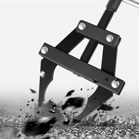 Heavy Duty Motorcycle Chain Tensioner Tool Large Steel Multifunctional Bike Chain Tightener Pro Grade close-up of claw gripping debris.