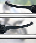 One Inch 25mm Hydraulic Clutch And Brake Master Cylinder Lever Kit for motorcycle with chrome finish, left and right view.