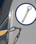 Two Pack 304 Stainless Steel M12x80 Shoulder Eyebolt With Nut installed on concrete wall for hanging support
