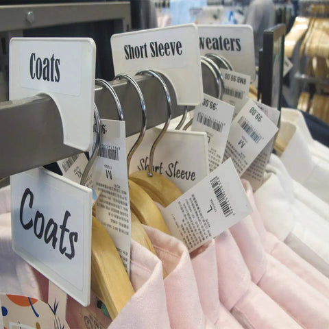 Pearl White Large Rectangular Closet Dividers Set with labeled dividers organizing clothing sizes on a rack.