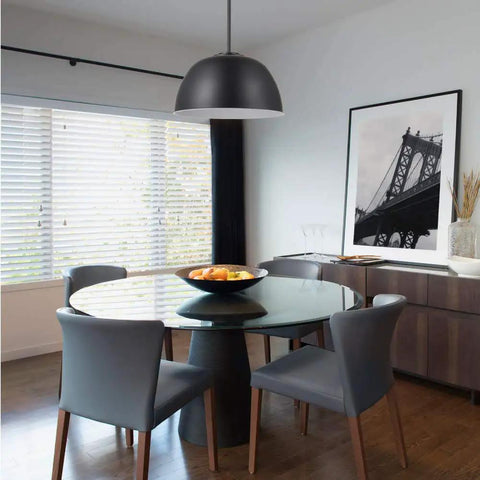 Warren 1 Light Pendant in Matte Black with White Interior Dome Shade above dining table, chic farmhouse vibe