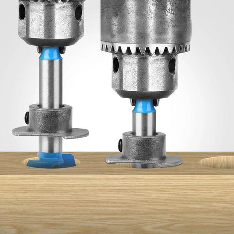 Front view of Floweringbeter carbide hinge boring bit set with blue collars over wooden workpiece