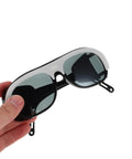 Kickass Welding Safety Glasses Featuring Wide Side Coverage And Mask Compatible Design For Total Eye Protection With Ridiculously Comfortable Fit Guaranteed held in hand