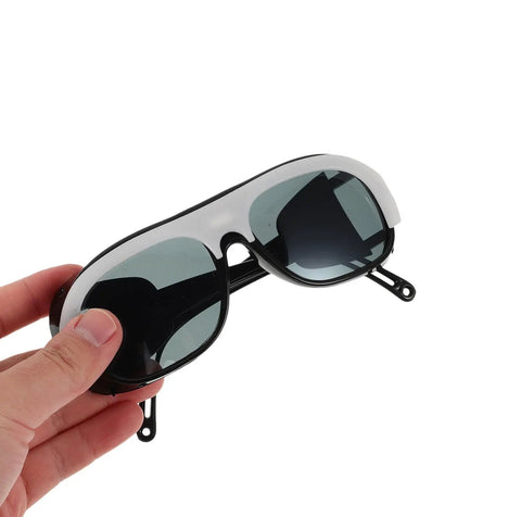Heavy Duty Welding Safety Glasses With 10 Spare Lenses, showing snug fit and tinted lenses for optimal protection.