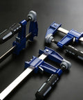 Professional Grade Eighteen Inch F Clamp Boasts A Smooth Quick Release Lever.  Blue frame clamps with ergonomic handles.