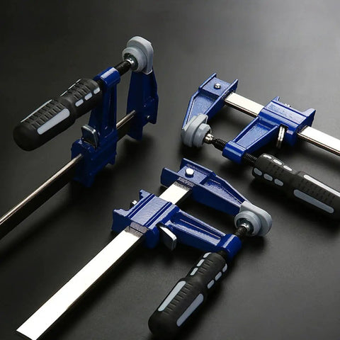 Professional Grade Eighteen Inch F Clamp Boasts A Smooth Quick Release Lever.  Blue frame clamps with ergonomic handles.