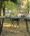 Hella Solid Folding Replacement Table Legs With Adjustable Height Support Stand For Outdoor Camping And Backyard Hangouts set up with cookware.