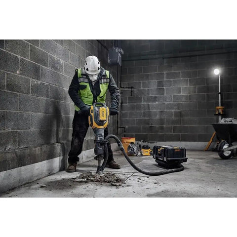 Pro 60V Brushless Breaker Hammer Kit Built As A Straight Shooter Heavy Hitter in action breaking concrete.