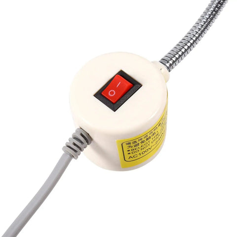 Close-up of power switch for 30 Led Industrial Grade Magnetic Work Light For Garage And Professional Workshop Dual Voltage 110V To 240V Pro Tradesman Favorite Clings Like Crazy To Metal Lathes Grinders.