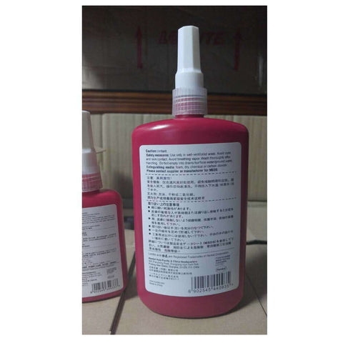 Rear view of Blue Medium Strength Threadlocker For Metal Nuts And Bolts That Locks Them Down And Prevents Vibration Loosening 360 Degree Fahrenheit Maximum Temperature 250 Milliliter Bottle For Industrial And Home Projects in red packaging.