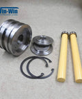 Waterjet piston assembly spare parts: two yellow rods, metal pistons, and O-ring seals.