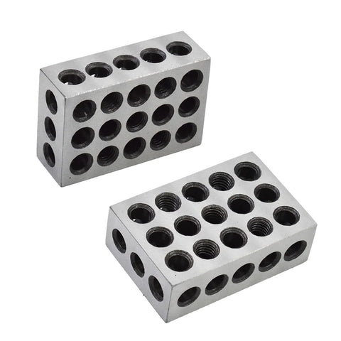 Two 1x2x3 inch hardened steel machinist setup blocks with 23 holes, shown from side and top.