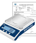 Ultra Precise Digital Scale With 2000g Capacity And 0.01g Resolution For Lab Jewelry And Business Use next to calibration certificate