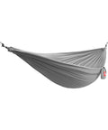 Go-To Nano 7 Ultra Light Hammock For Camping And Travel With Ripstop Nylon in suspended position with carabiners.