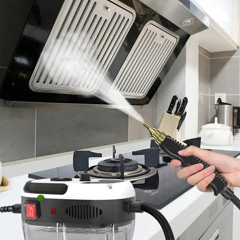 Cleaning a stovetop with Boss 2500W Handheld Steam Cleaner For Car Detailing And Home Cleaning, High Temp Portable Steamer, White