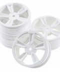 White 52mm On Road Drift Wheel Hubs For RC Cars in lightweight plastic with impact-resistant design, shown stacked and angled