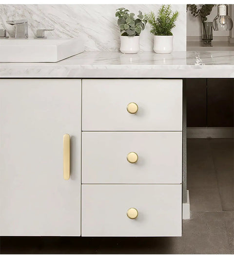 Gold polished cabinet handles on white drawers, 2 Pack Kitchen Cabinet Handles And Drawer Pulls Set For Cabinets And Wardrobes