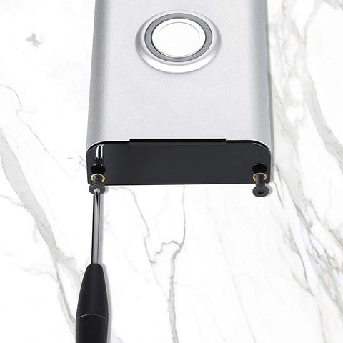 Video Doorbell Replacement Security Screws Kit, 20 Pcs, being installed on a doorbell using a screwdriver with marble background