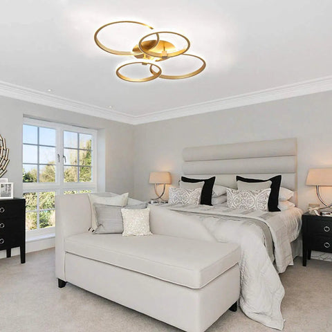 Modern 76W LED Chandelier Four Ring Flush Mount Ceiling Light Round Acrylic Ceiling Lamp in a bedroom setting