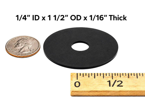 Non Conductive EPDM Rubber Fender Washers 1/4 Inch ID by 1-1/2 Inch OD, 1/16 Inch Thick next to a coin and ruler