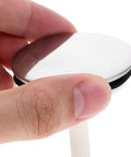 Bathtub Drain Stopper with Rotating Design and Silicone Seal Ring held in hand, showcasing its polished silver surface and seal.