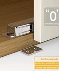 Push To Open Magnetic Door Catch Set 2 Pack Heavy Duty Stainless Steel Cabinet Latches mounted inside a wooden cabinet.