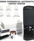 Game Changing 58Mm Automatic Espresso Tamper Machine With Touch Screen Dial And Adjustable Pressure For Hassle Free Coffee Puck Compaction In Tough Stainless Steel next to a portafilter.