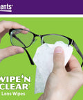Close-up of hands wiping glasses with Flents Wipe 'N Clear lens wipes; pre-moistened, individually wrapped